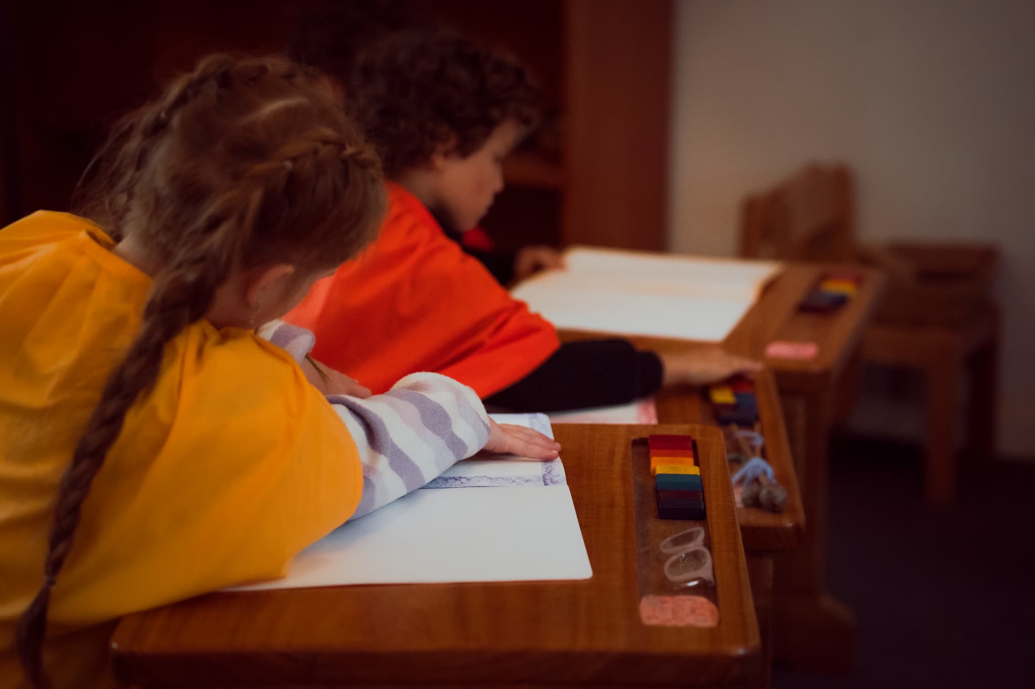 Children drawing with beeswax block crayons